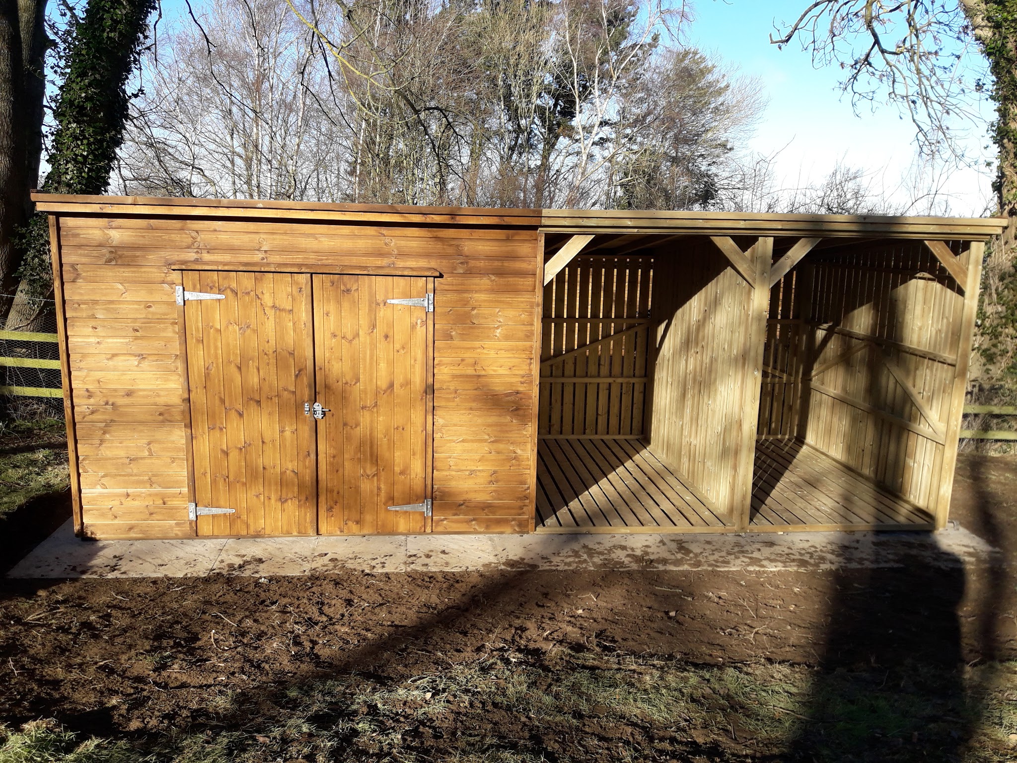 Stained lockable store joined to an open log store