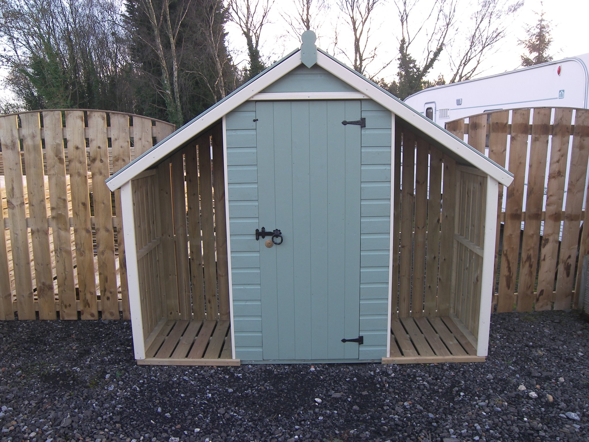 Sage double combination store with log bays on both sides