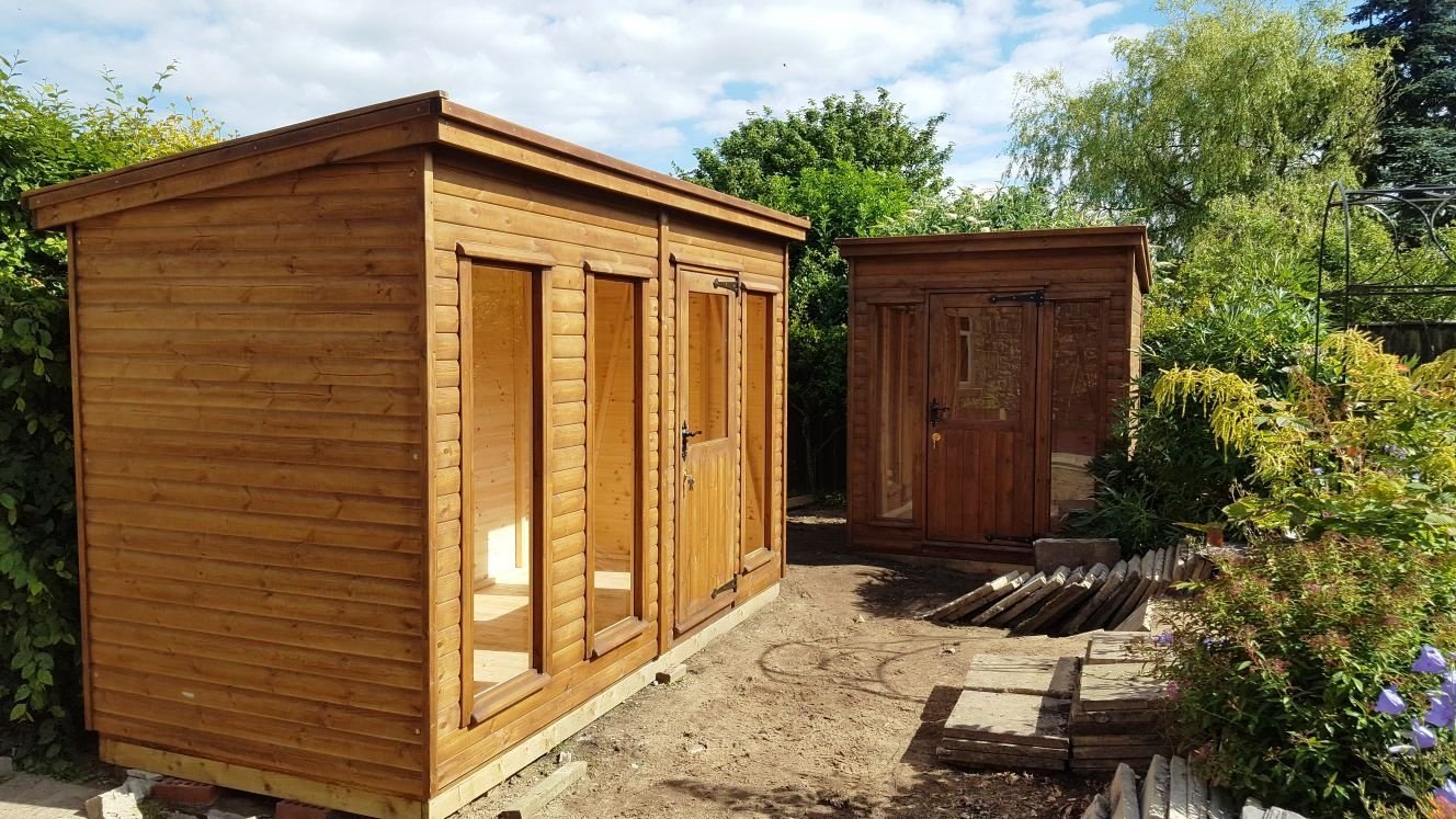 Long pent summer house with a store at one end